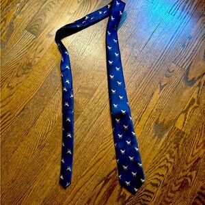 Blue necktie with dinosaurs